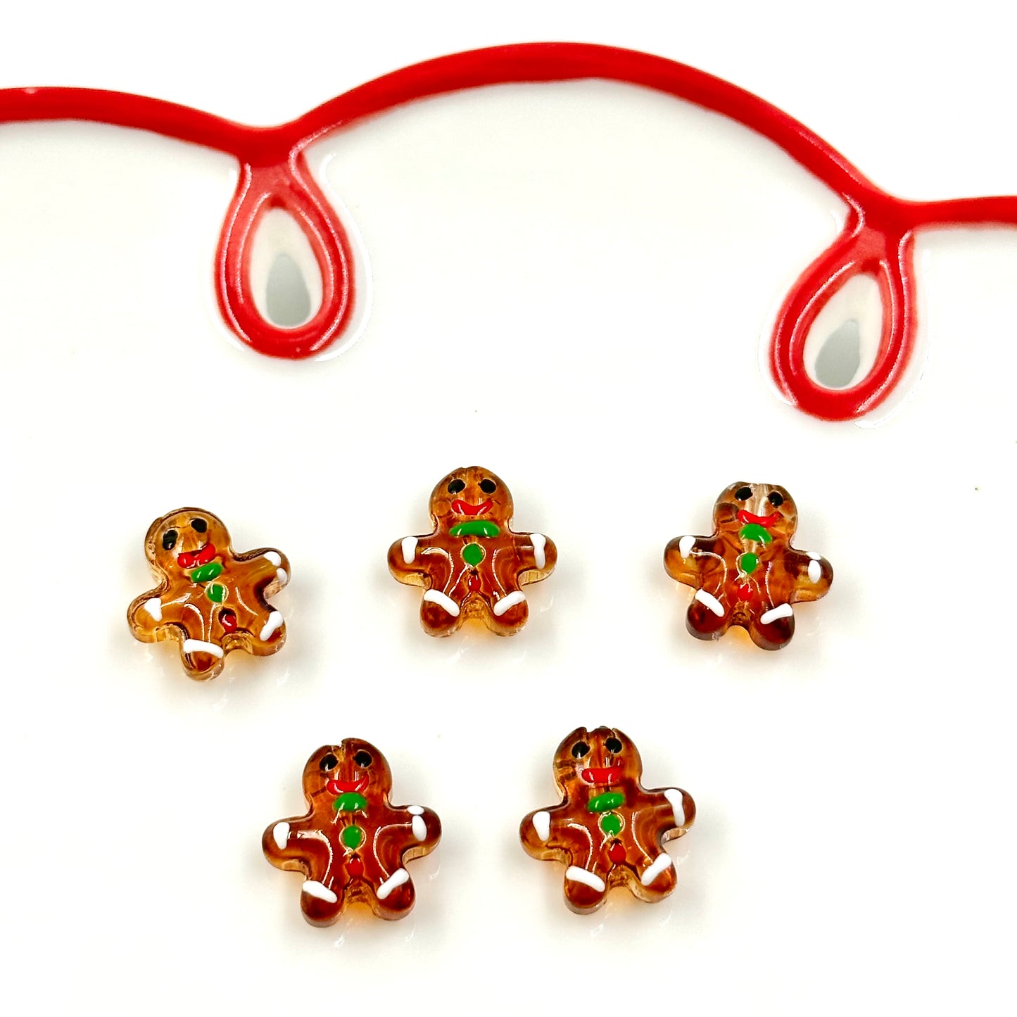 Glass gingerbread man lampwork bead